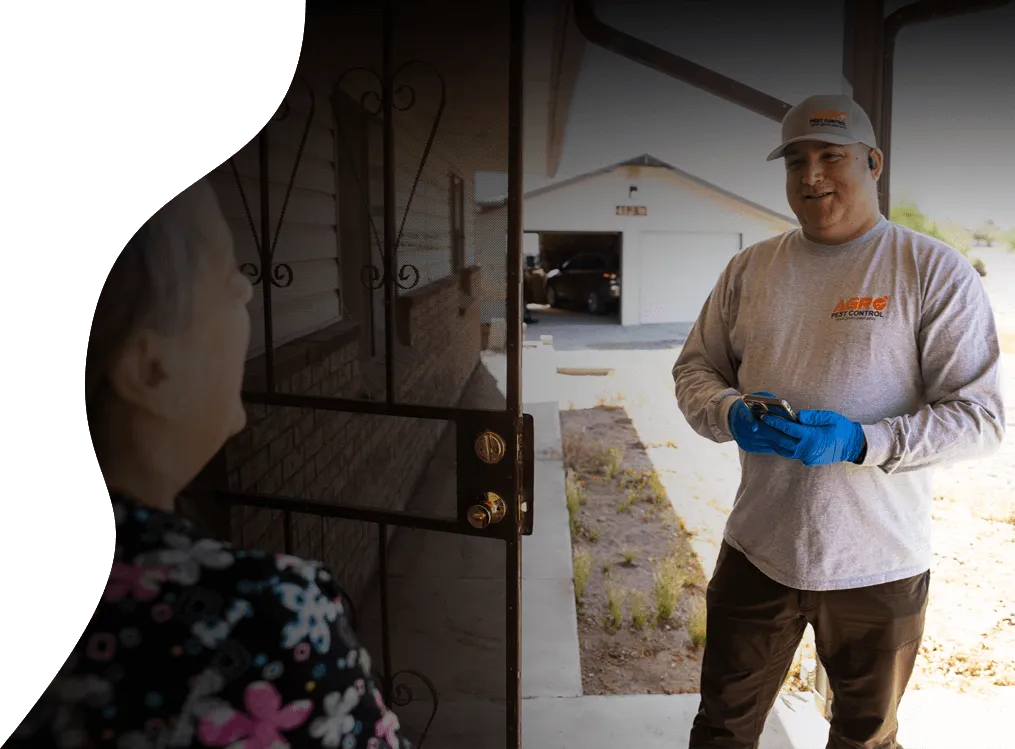 Agro Employee talking with a customer.